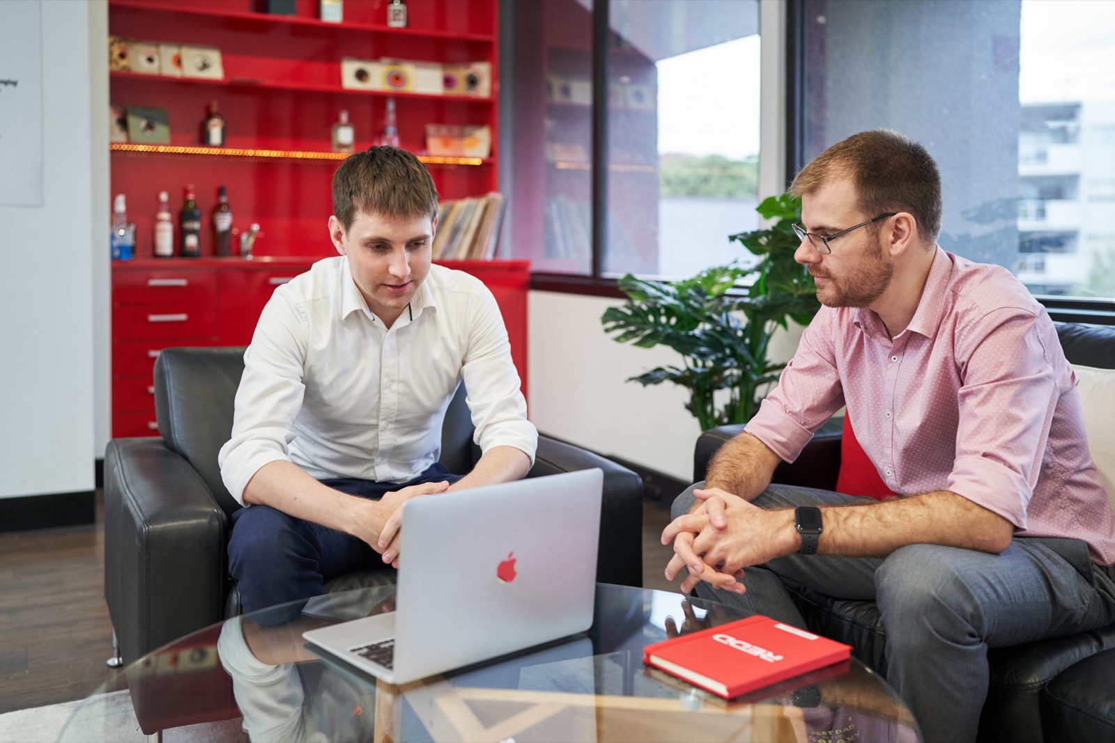 REDD engineers working through a secure AI rollout with a client